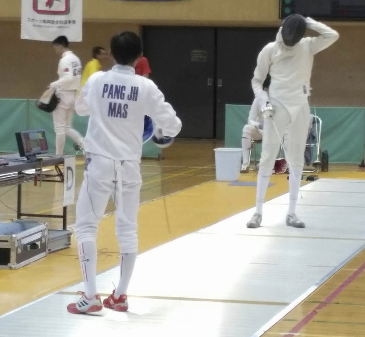 Pang Jun Han on the fencing piste for Malaysia, Gotemba 2017