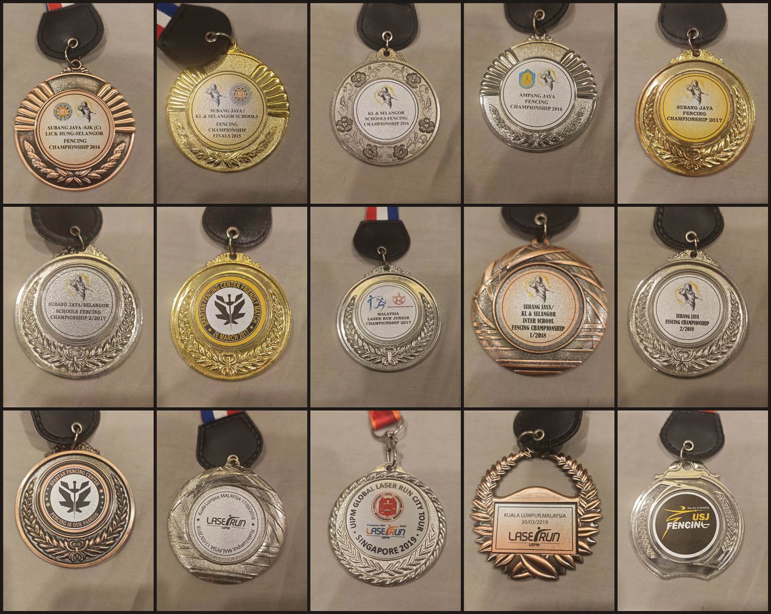 Selected fencing and laser run medals of Pang Jun Han, 2014-2022, from his personal collection