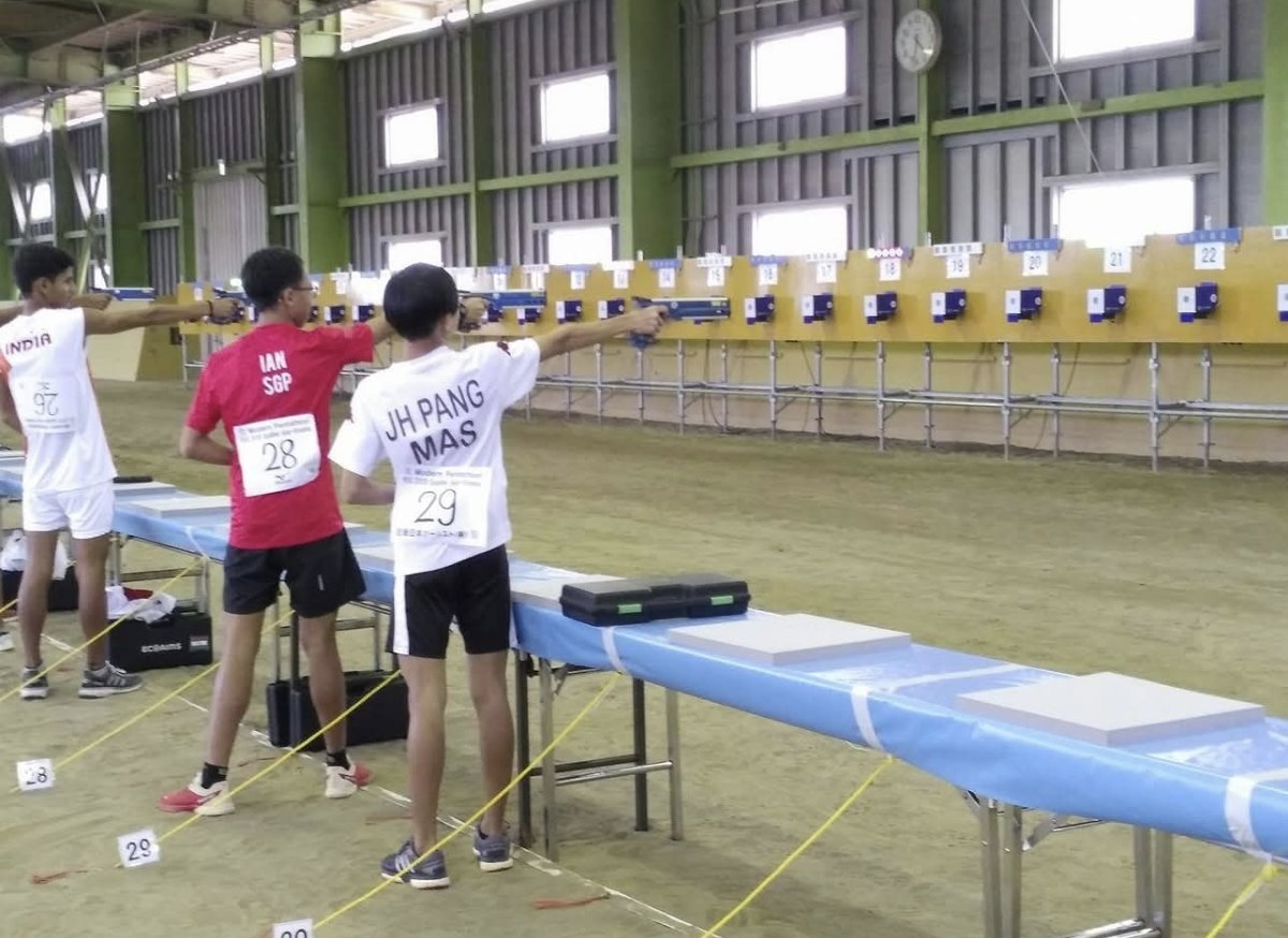 Pang Jun Han (JH PANG, MAS, bib 29) in the laser-run shooting range at Gotemba 2017